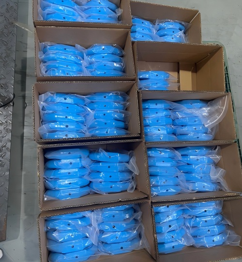 Custom metal parts securely packaged for shipment, ready for global delivery from Rilon.