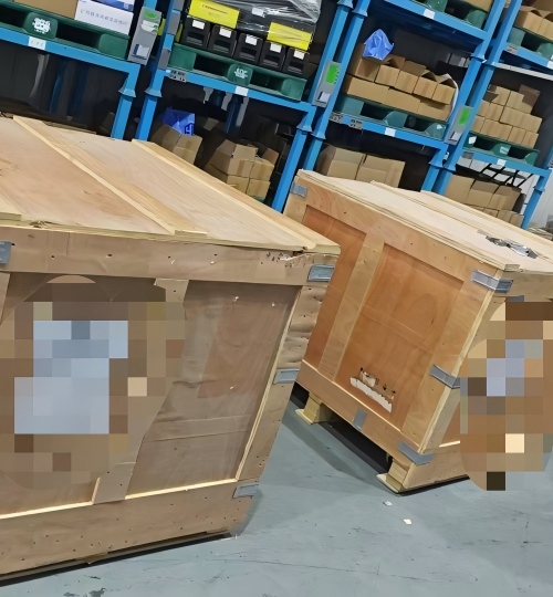 Custom metal parts packed in heavy-duty reinforced wooden crates, meeting international export standards for zero-damage delivery.