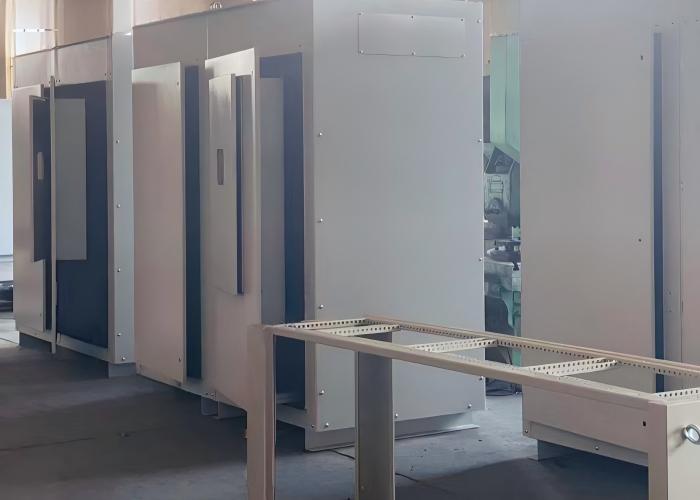 Industrial sheet metal enclosure integration with mechanical assembly and electrical component installation.