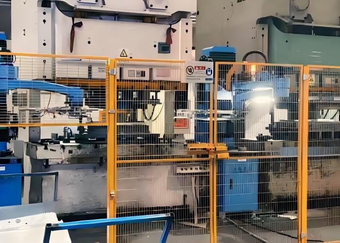 Industrial CNC press brake machine performing precision multi-axis sheet metal bending for tight-tolerance components.